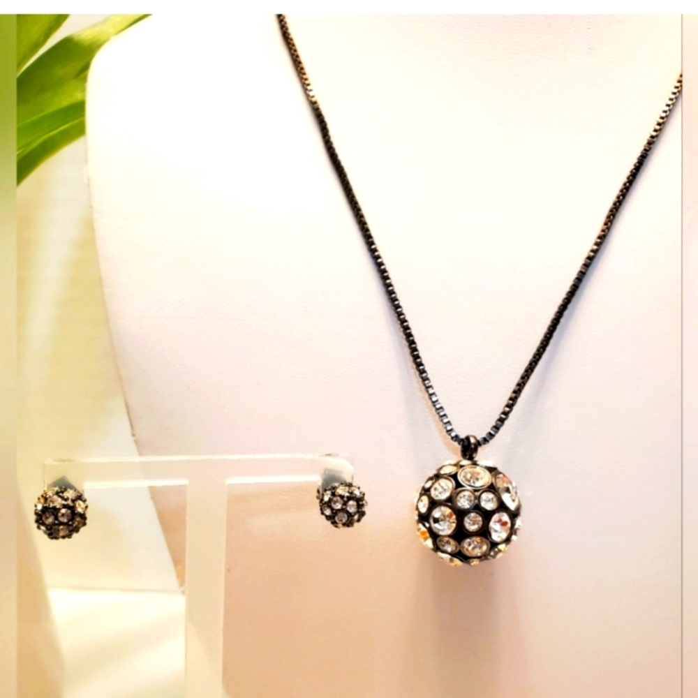 Fossil gun metal chain necklace with round bedazzled charm & matching studs.